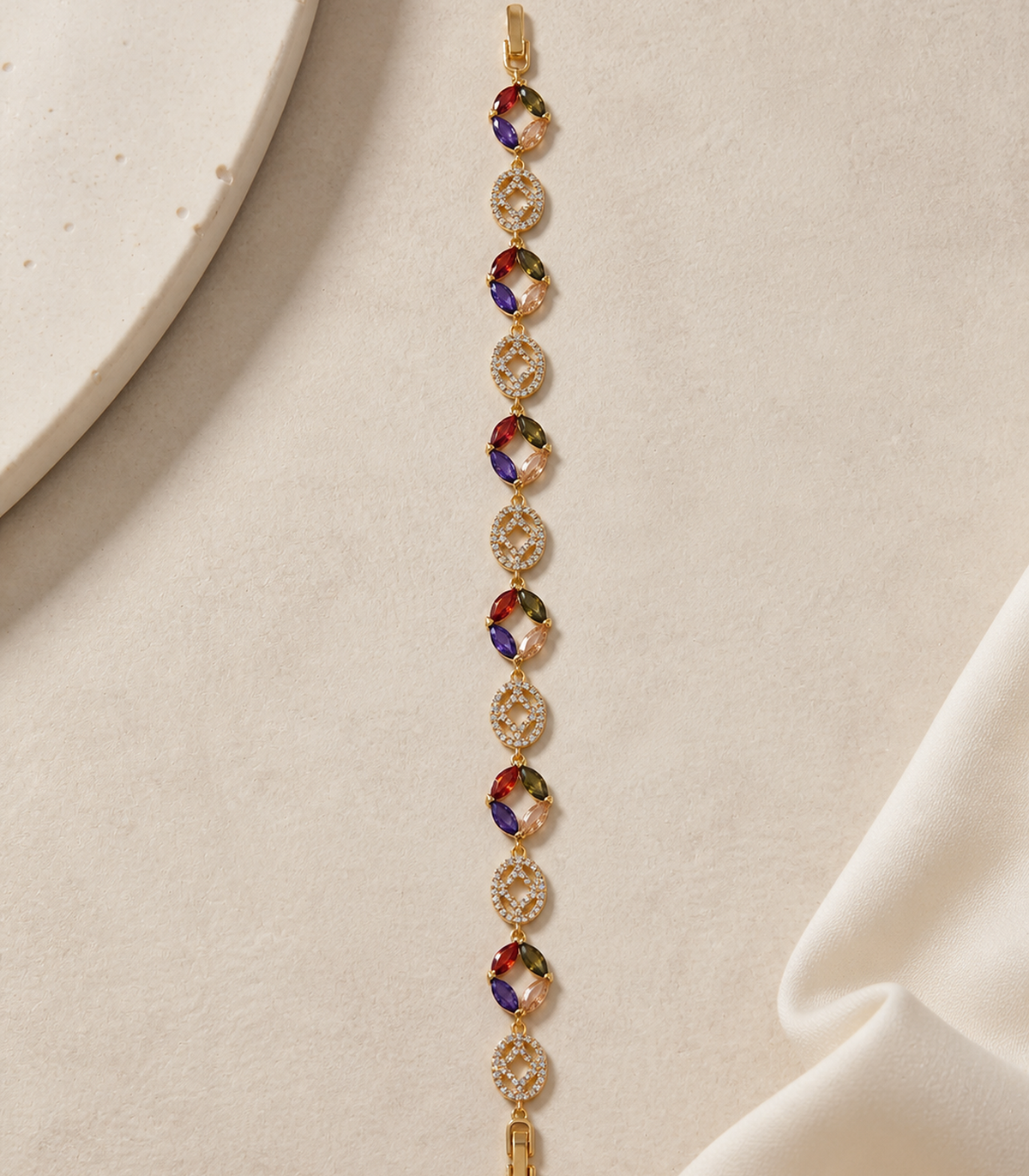 Multicolor Marquise Medallion Link Bracelet in an editorial flat lay
