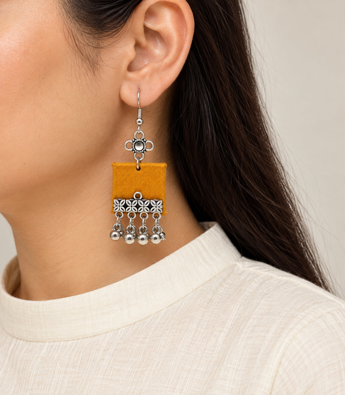 Mustard Square Fabric Ghungroo Earrings – model
