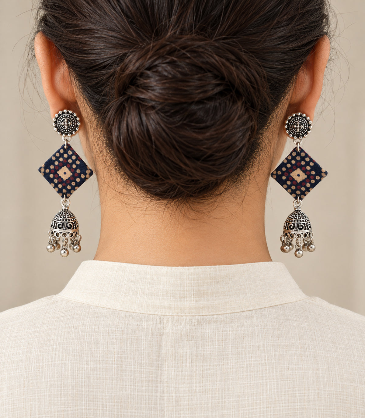 Navy dotted diamond fabric jhumka earrings — model