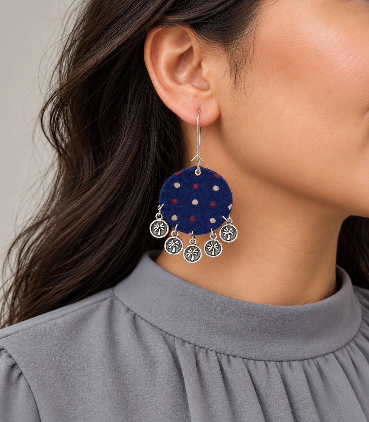 Navy dotted round fabric coin earrings - closeup view