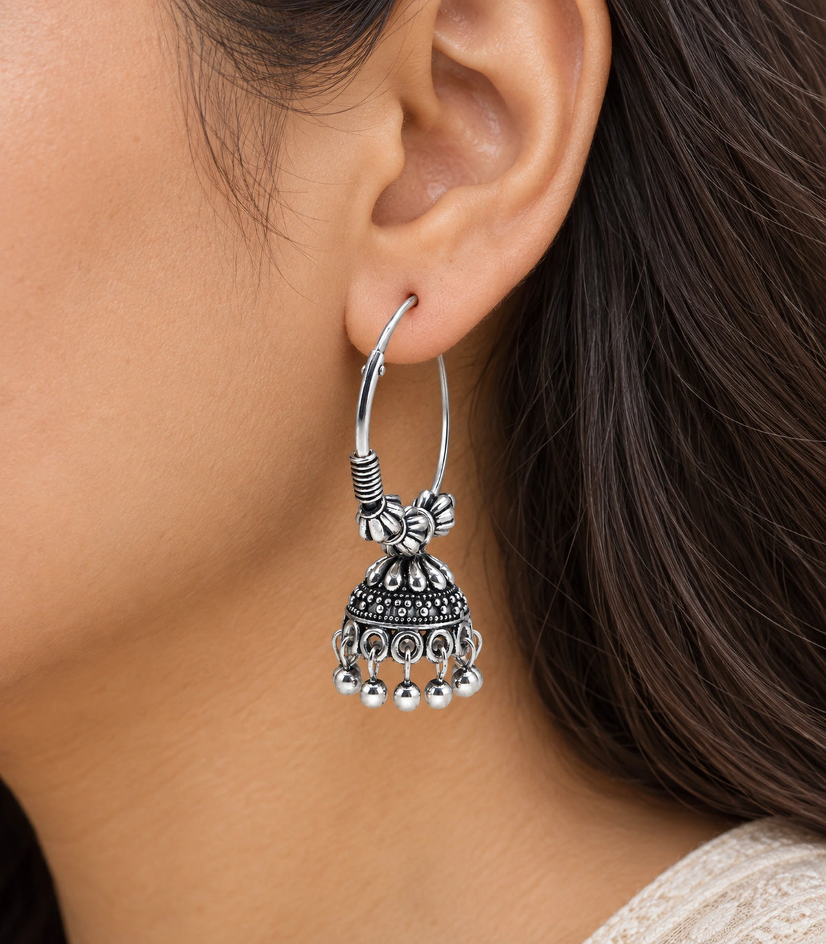 JIMIKI Oxidized Silver Floral Hoop Jhumka Earrings - close-up of patterned drop and bead fringe #color_oxidized-silver