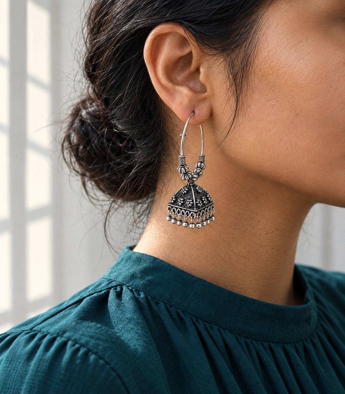 JIMIKI Oxidized Silver Floral Pyramid Beaded Hoop Jhumka Earrings - Editorial worn view #color_oxidized-silver
