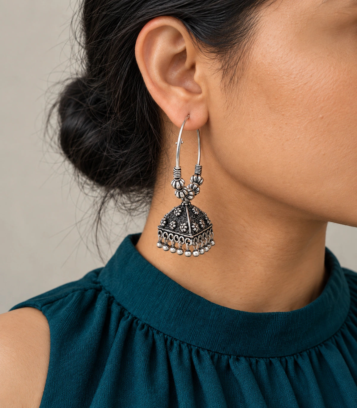 JIMIKI Oxidized Silver Floral Pyramid Beaded Hoop Jhumka Earrings - Worn styling view #color_oxidized-silver