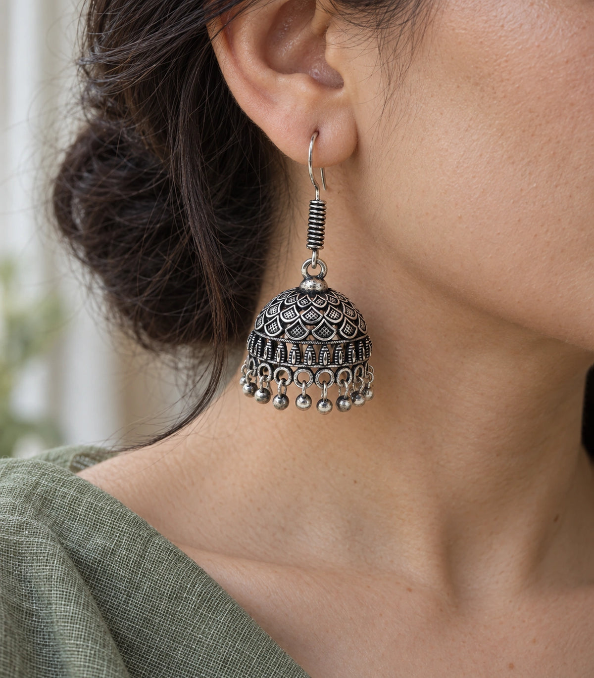 JIMIKI Oxidized Silver Layered Leaf Scale Hook Jhumka Earrings in Oxidized Silver - editorial worn view #color_oxidized-silver