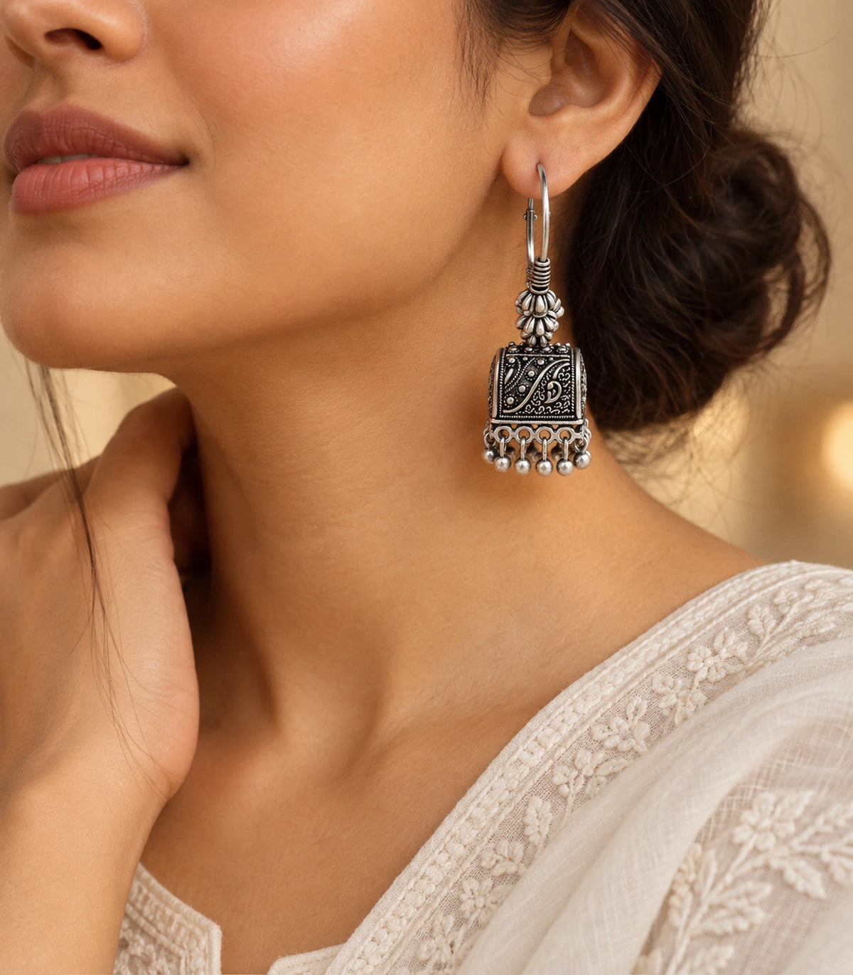 JIMIKI Oxidized Silver Paisley Cube Hoop Earrings - editorial styling with hair swept back #color_oxidized-silver