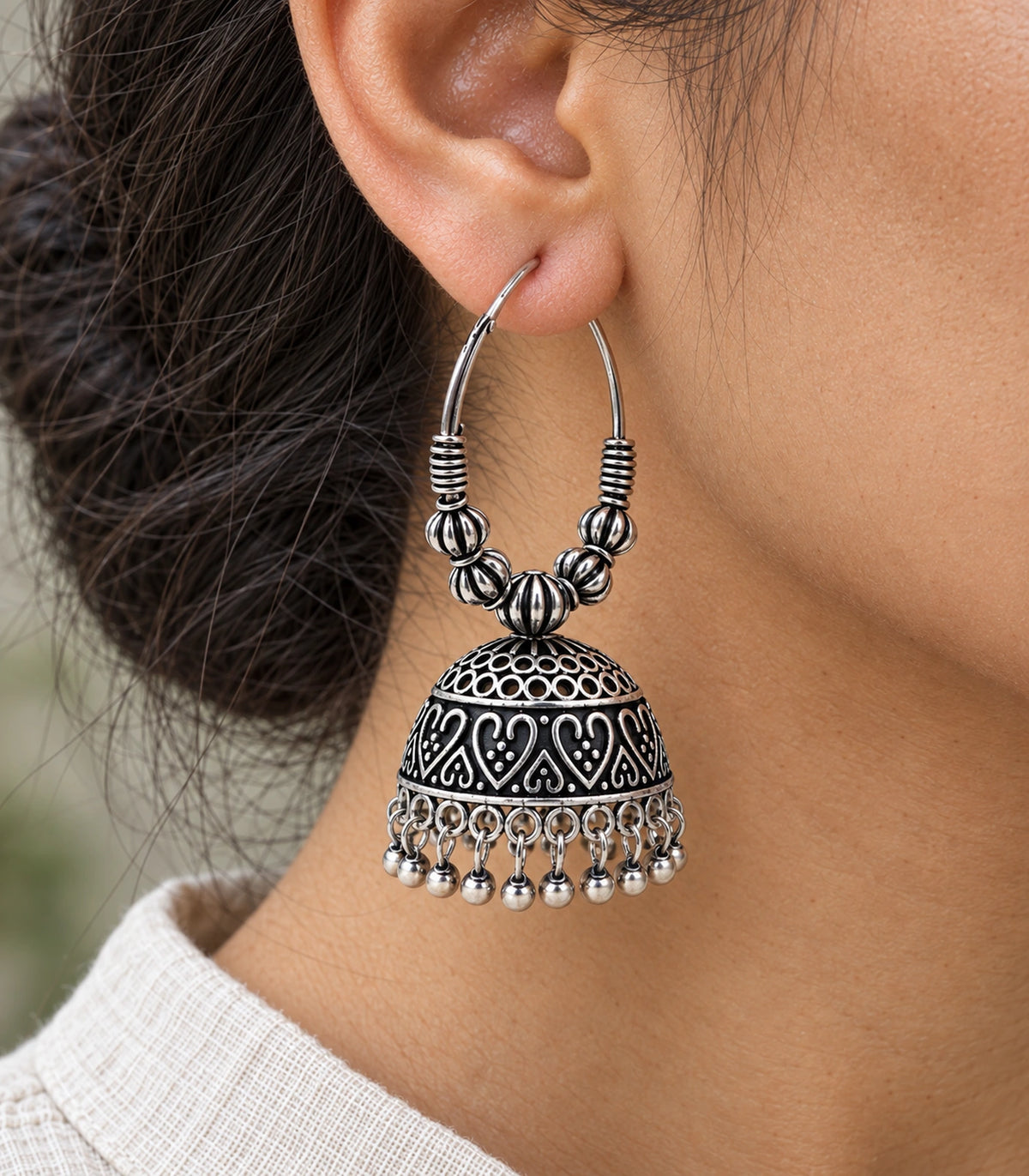 JIMIKI Oxidized Silver Ribbed Bead Hoop Heart Jhumka Earrings in Oxidized Silver - close-up details #color_oxidized-silver