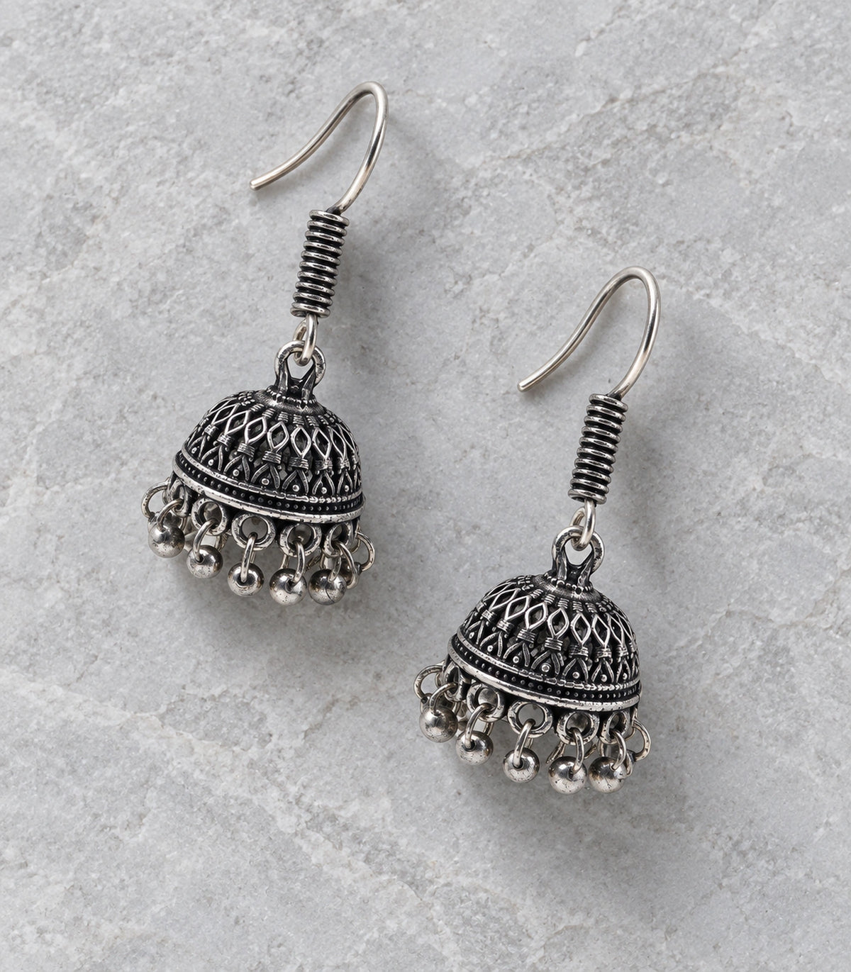 JIMIKI Oxidized Silver Small Leaf Lattice Hook Jhumka Earrings in Oxidized Silver - editorial flatlay #color_oxidized-silver