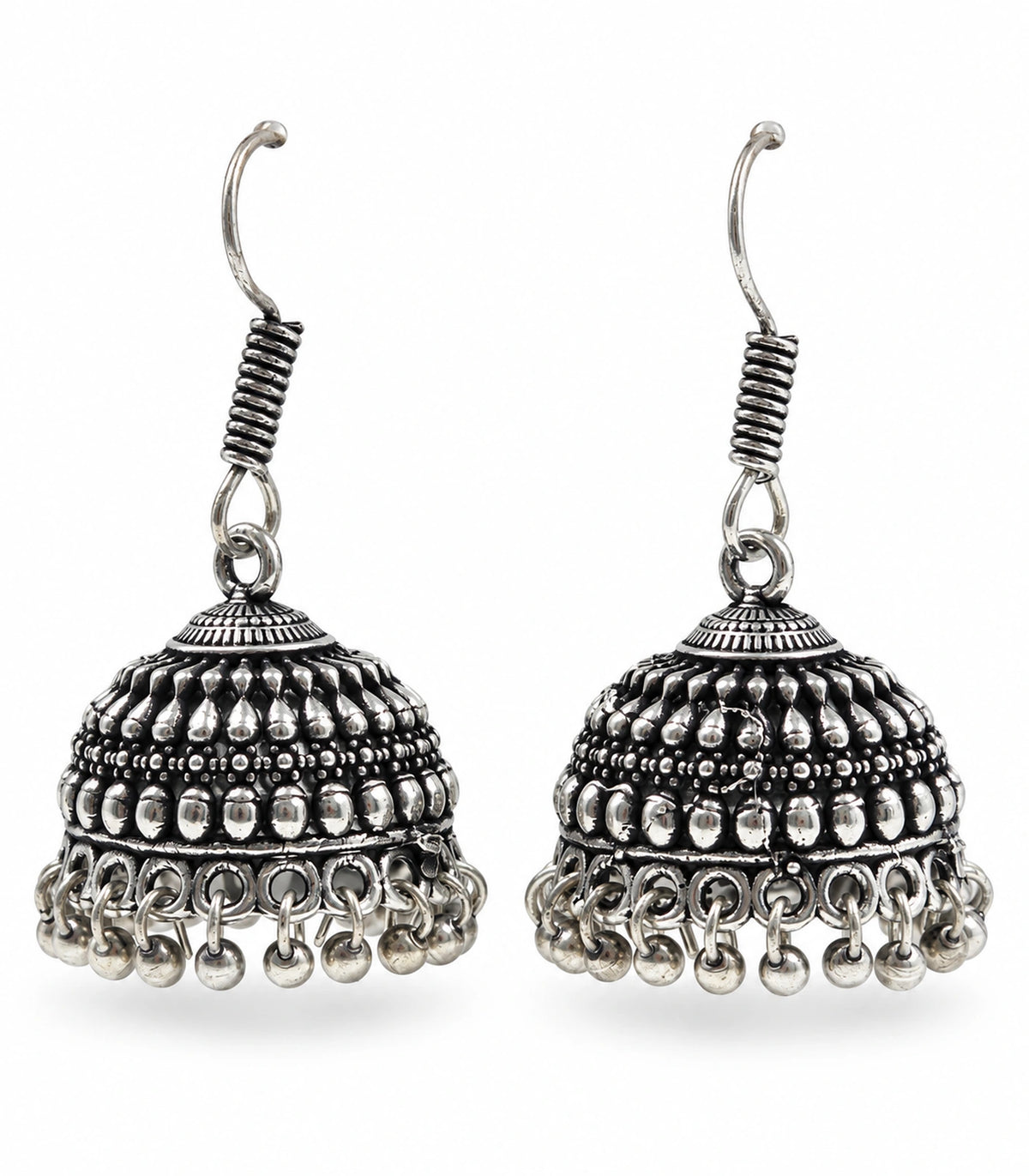 Pair of oxidized silver-tone teardrop relief jhumka earrings on white #color_oxidized-silver