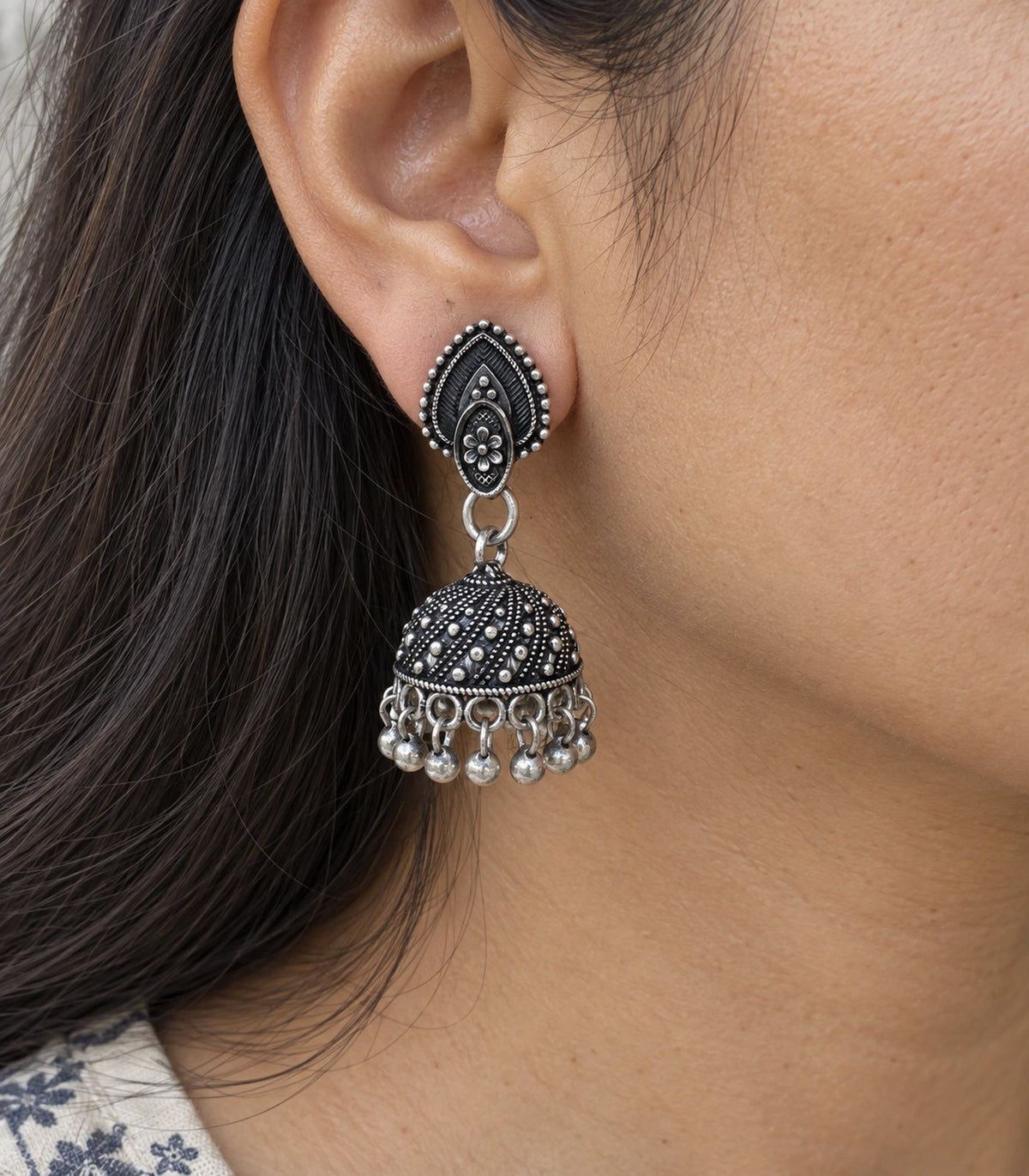 JIMIKI Oxidized Silver Teardrop Stud Dotted Dome Jhumka Earrings in Oxidized Silver - close-up details #color_oxidized-silver