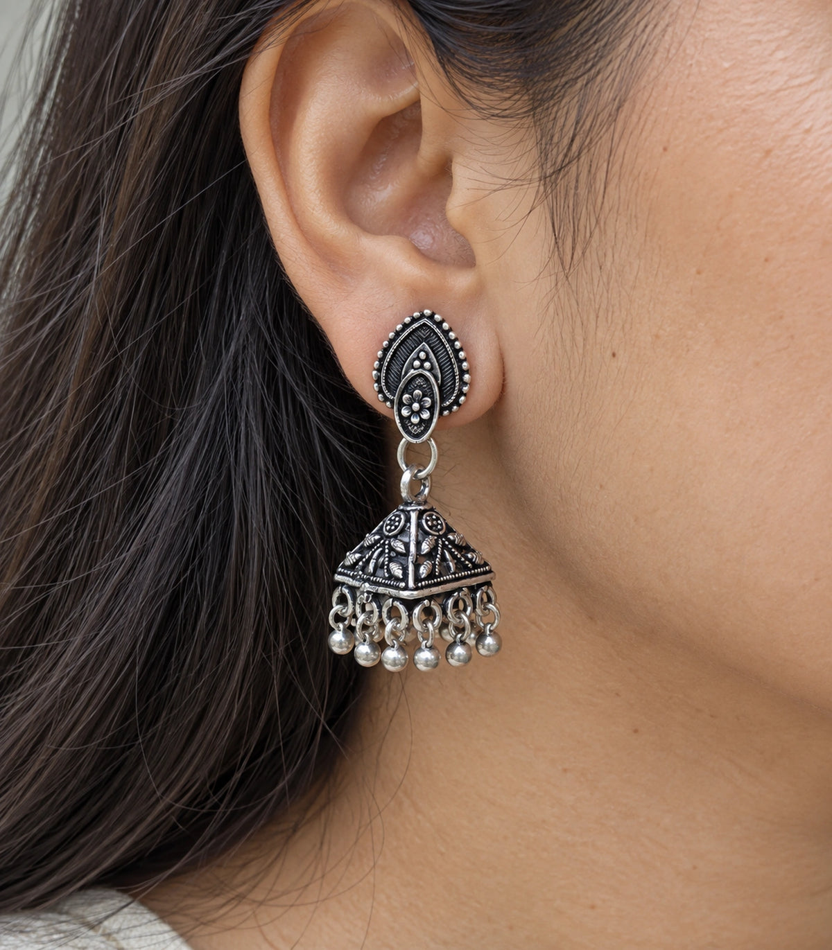 JIMIKI Oxidized Silver Teardrop Stud Floral Pyramid Jhumka Earrings in Oxidized Silver - close-up details #color_oxidized-silver