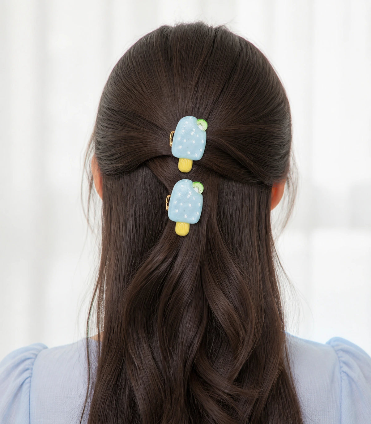 Model wearing the Pale Blue Kiwi Popsicle Clip Pair