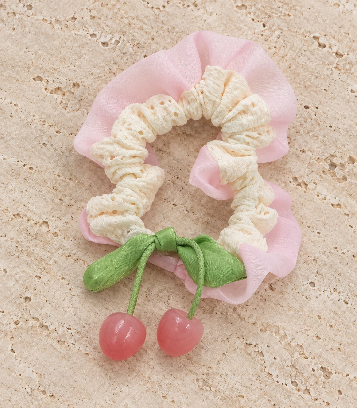 JIMIKI Lace Scrunchie With Cherry Charms in Pale Pink, editorial flat lay #color_pale pink
