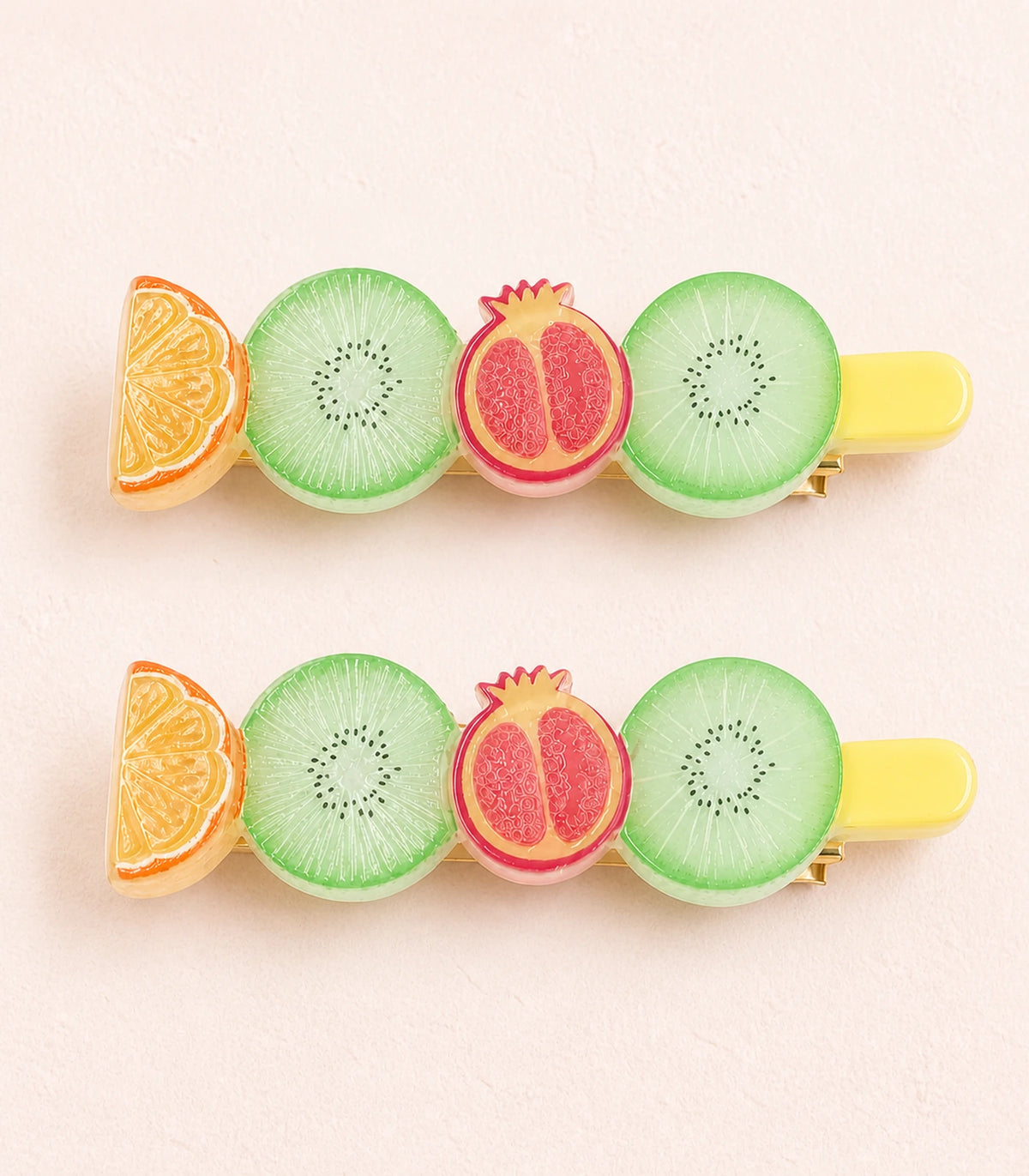 Close-up of the Pastel Citrus Mint Kiwi Pomegranate Barrette Pair details
