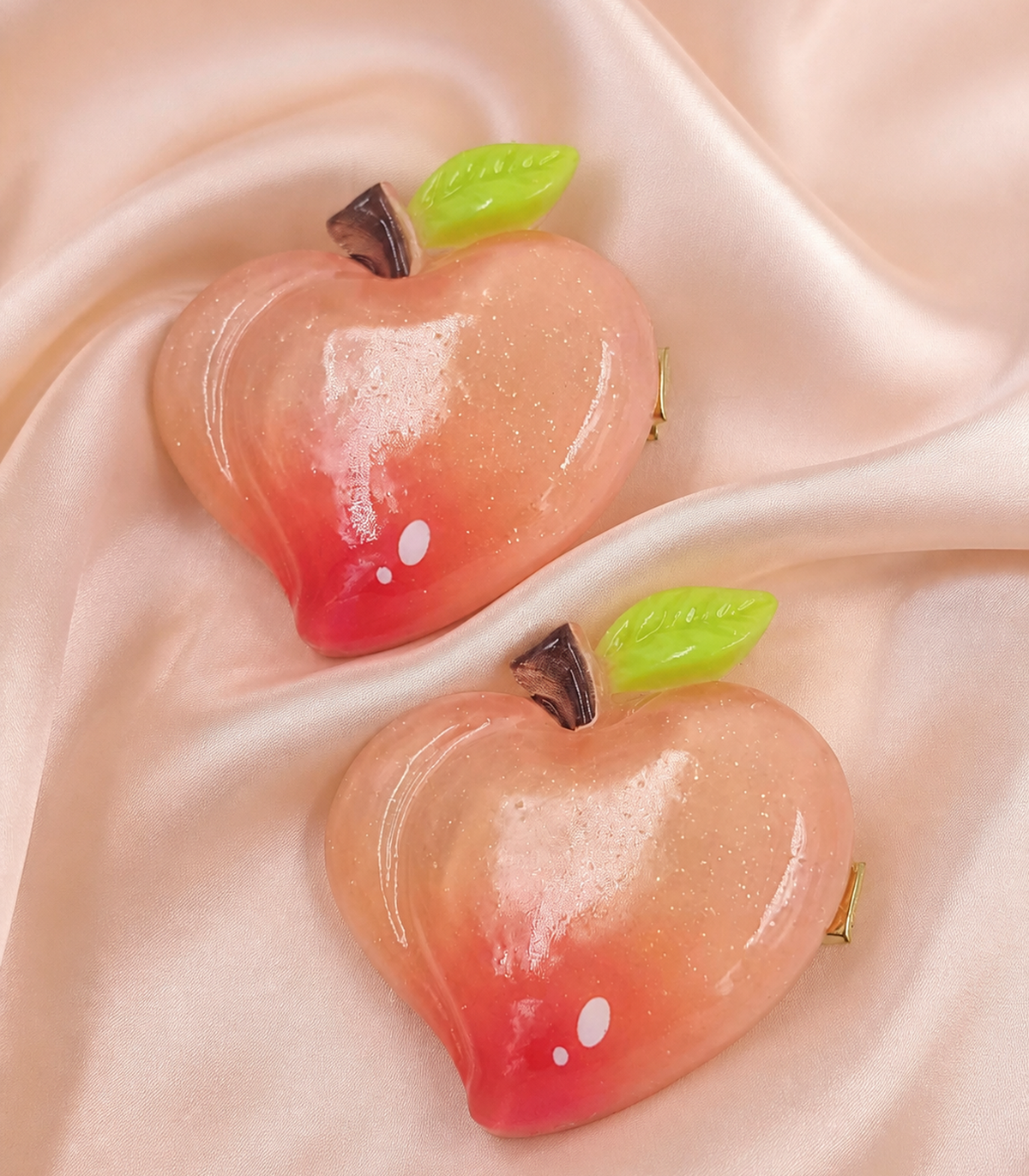 Peach Apple Barrette Pair close-up view