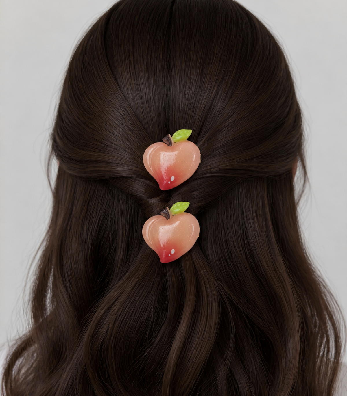 Peach Apple Barrette Pair styled editorial view