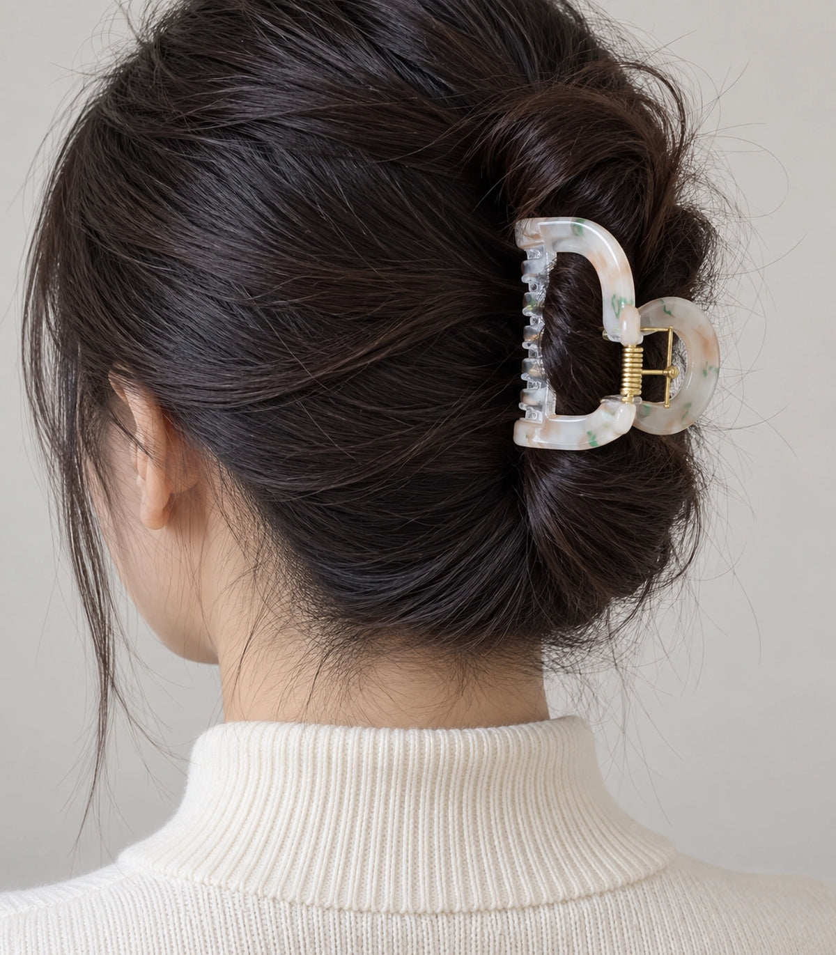 JIMIKI Marbled Heart Hair Claw Clips in Peach / Green, model wearing view #color_peach / green
