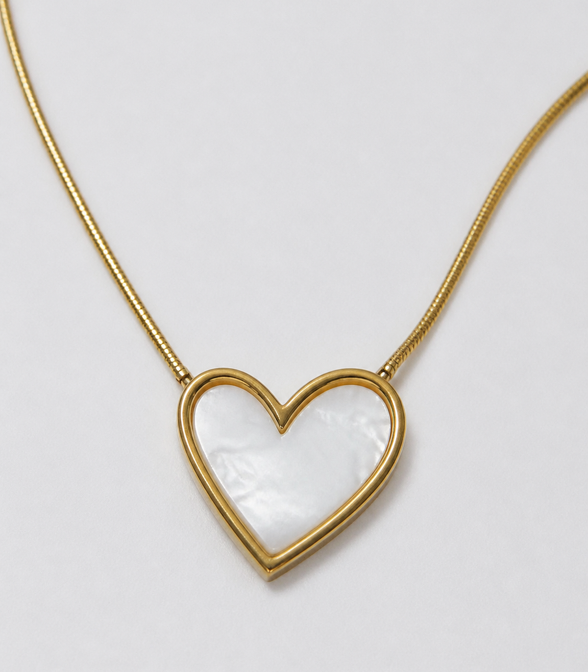 Close-up of Pearly White Heart Snake Chain Necklace