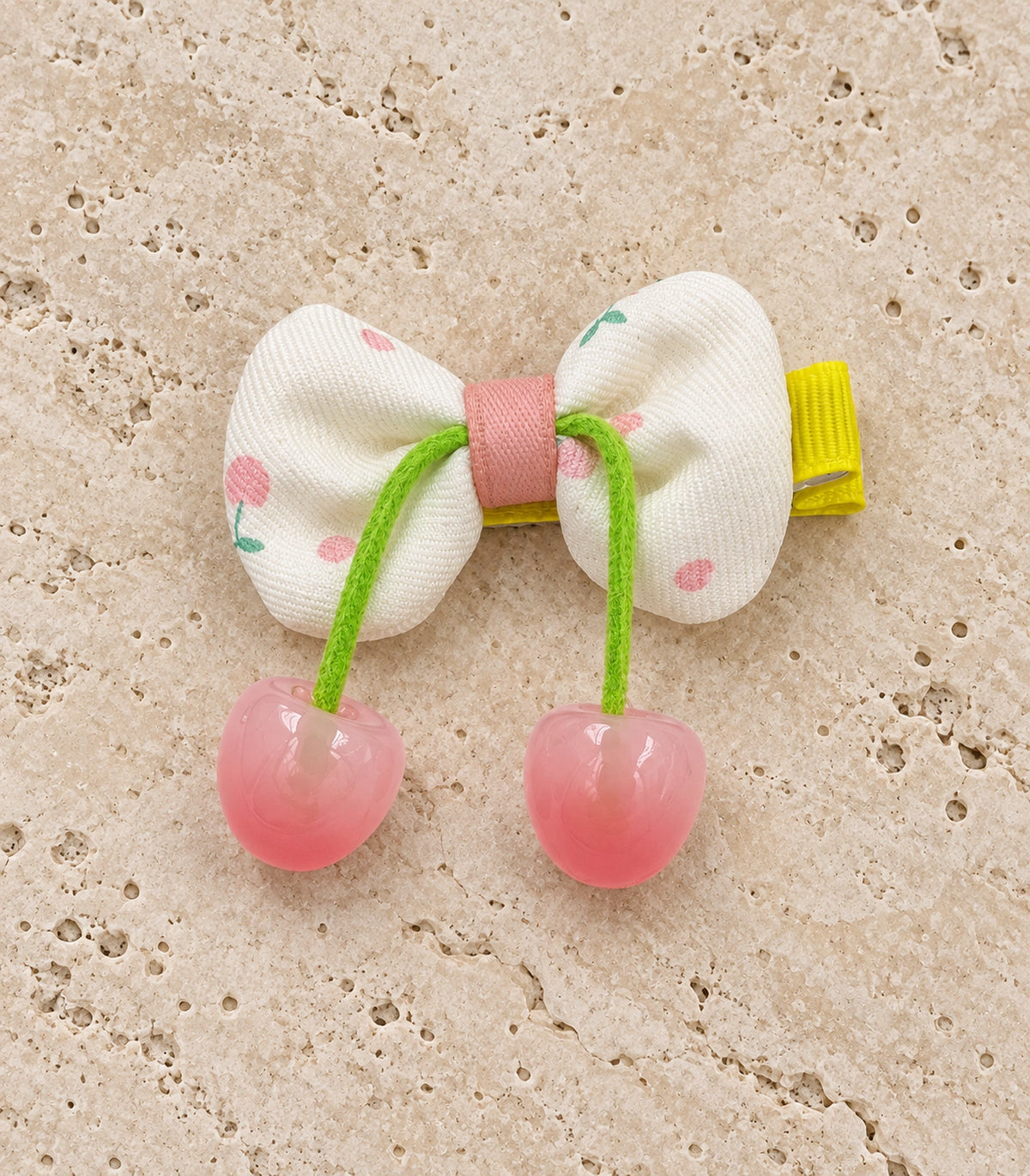 JIMIKI Cherry Print Bow Hair Clip With Cherry Charms in Pink, editorial flat lay #color_pink