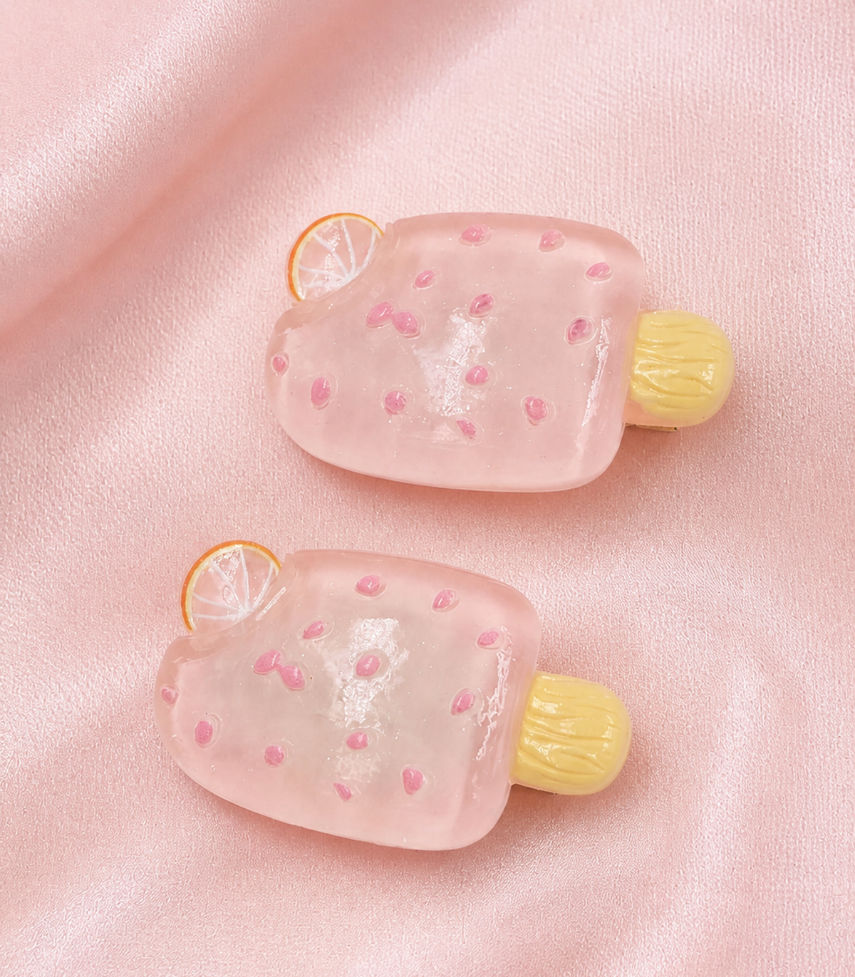 Pink Citrus Ice Pop Barrette Pair close-up view