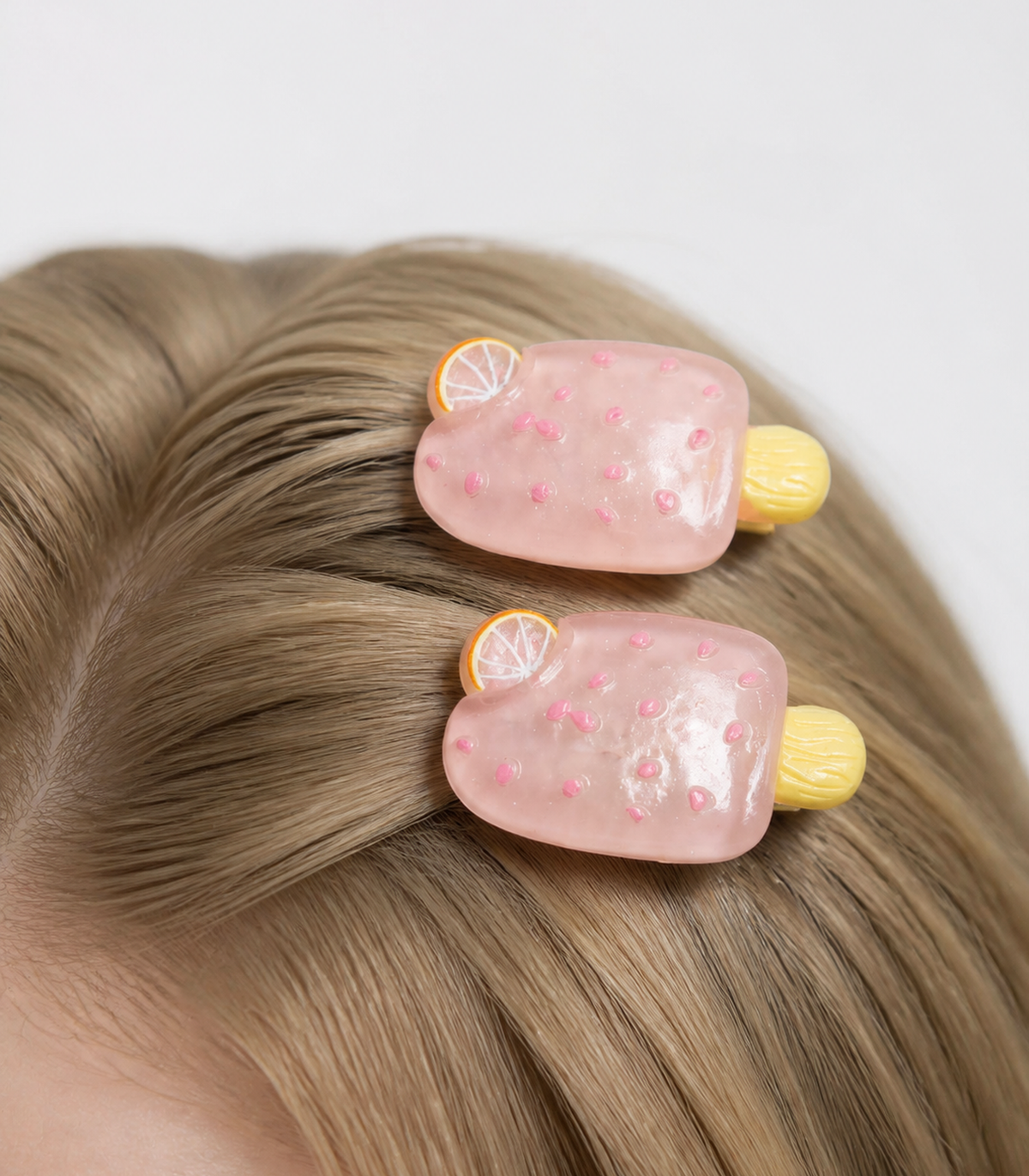Pink Citrus Ice Pop Barrette Pair worn in hair