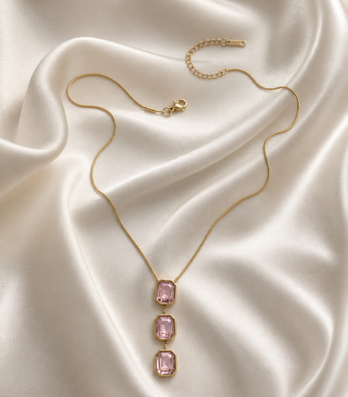 Pink Emerald Cut Y Necklace styled in a flat lay