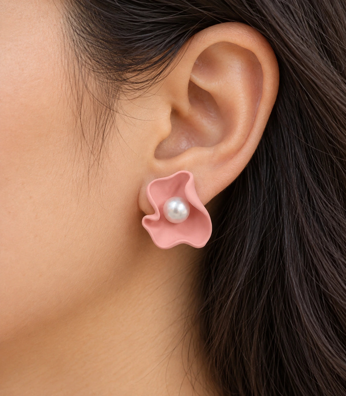JIMIKI Folded Calla Pearl Stud Earrings, Pink — worn close-up showing petal detail #color_pink