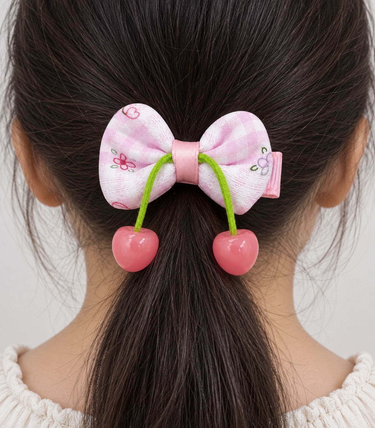 JIMIKI Pink Gingham Floral Bow Hair Clip with Cherry Charms in Pink, close-up detail