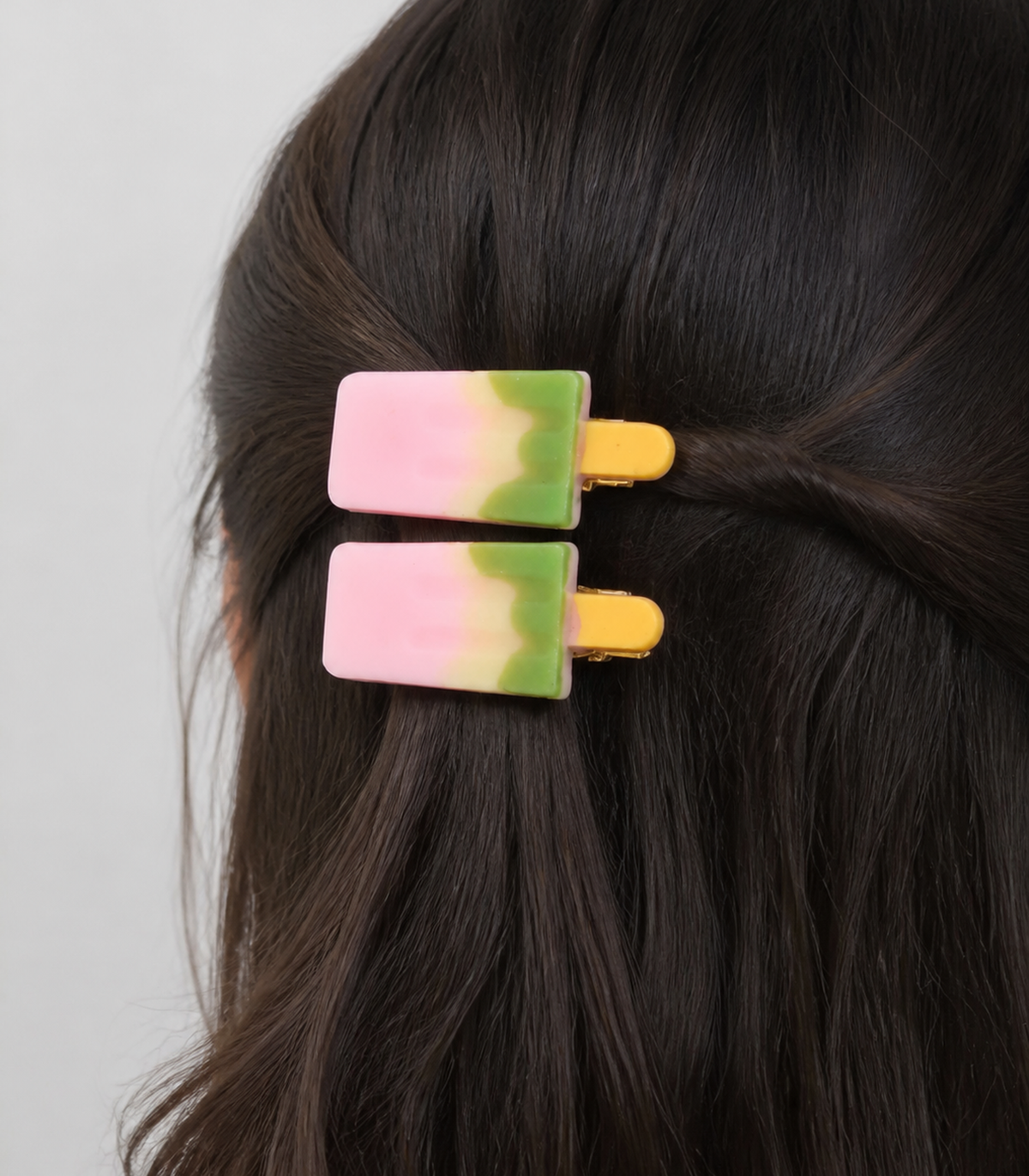 Pink Green Popsicle Clip Pair worn in hair