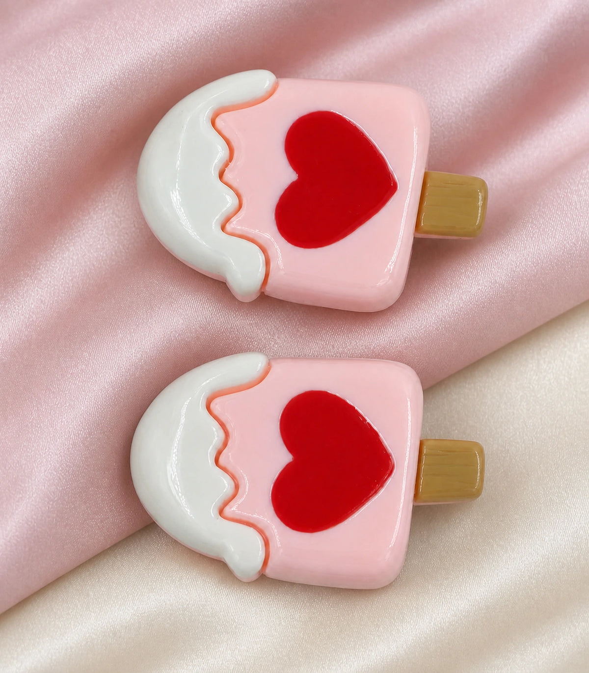Close-up of the Pink Heart Frosted Popsicle Clip Pair details
