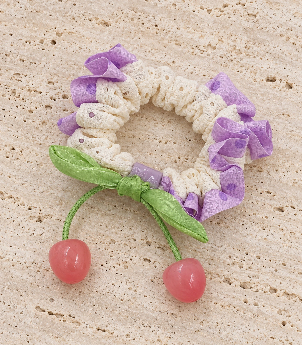 JIMIKI Polka Dot Lace Scrunchie With Cherry Charms in Purple, editorial flat lay #color_purple
