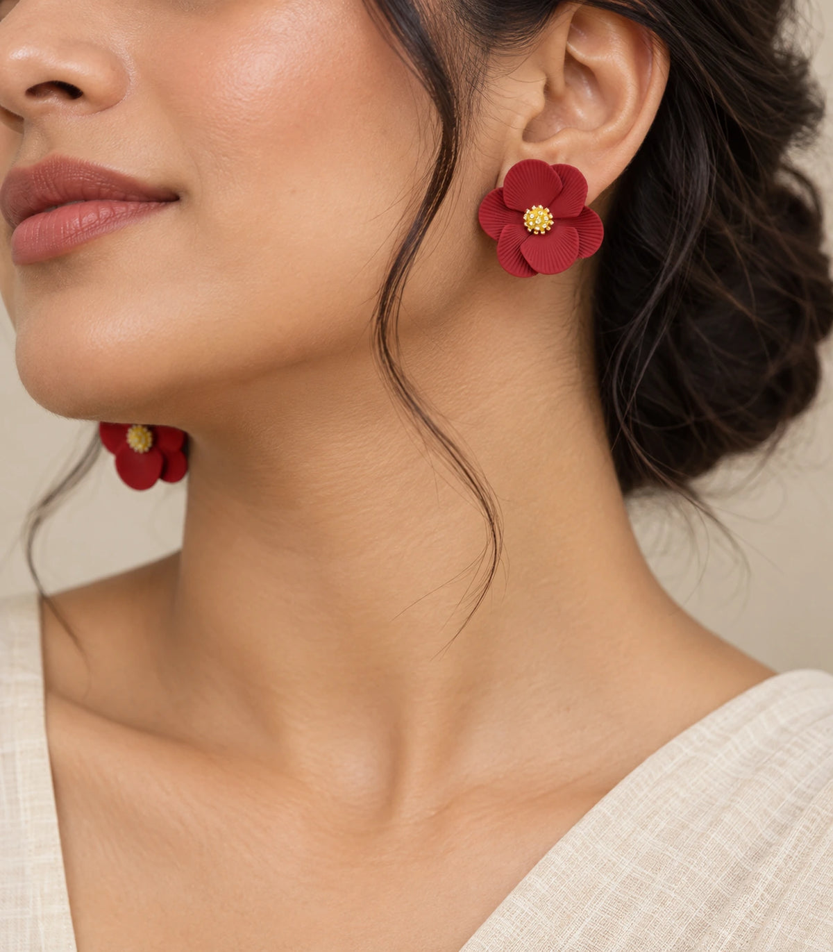 JIMIKI Red ribbed flower stud earrings, styled worn editorial view #color_red