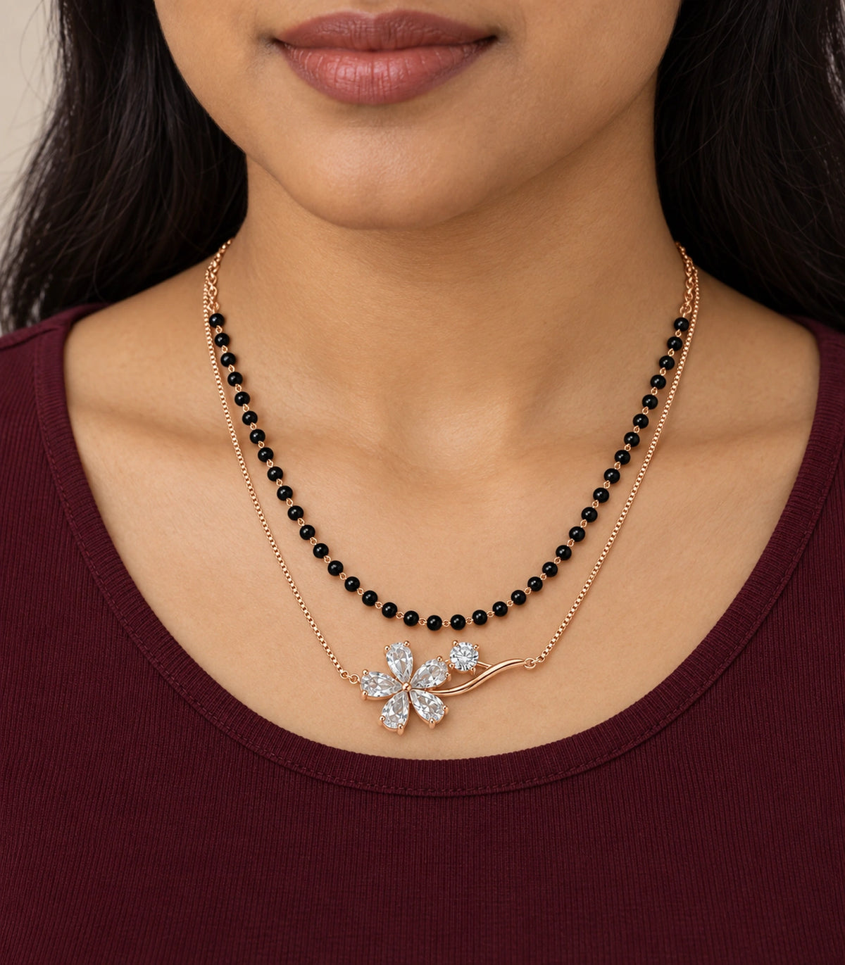JIMIKI Rose-Gold Black-Bead Crystal-Flower Layered Necklace in Rose Gold / Black - worn styling view #color_rose-gold-black
