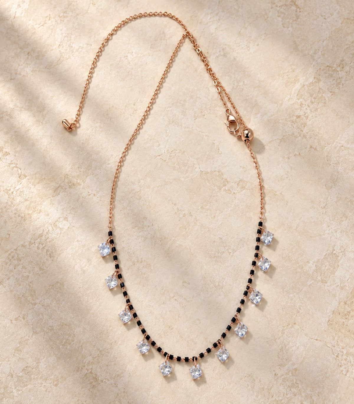 Rose Gold Black Bead Square Crystal Charm Necklace – editorial flatlay