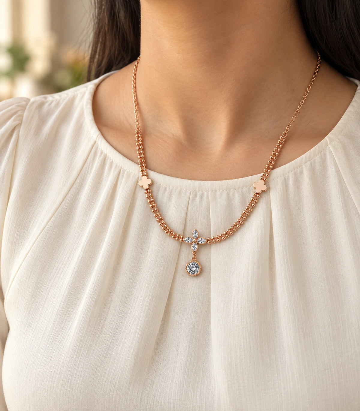 JIMIKI Clover Crystal Flower Drop Necklace in Rose Gold - editorial worn view #color_rose-gold
