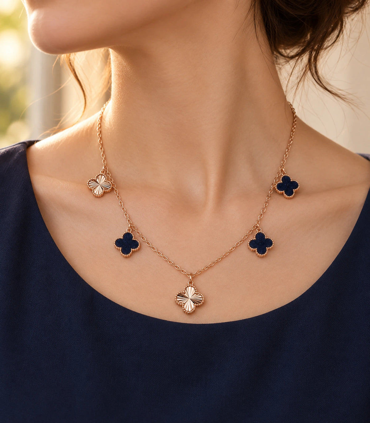 JIMIKI Rose Gold Dark Clover Charm Necklace in Rose Gold - editorial worn view #color_rose-gold