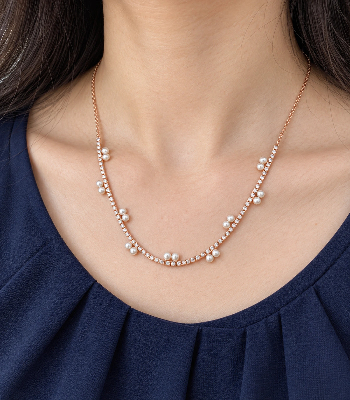 JIMIKI Rose Gold Paired Pearl Crystal Tennis Necklace in Rose Gold - close-up details #color_rose-gold