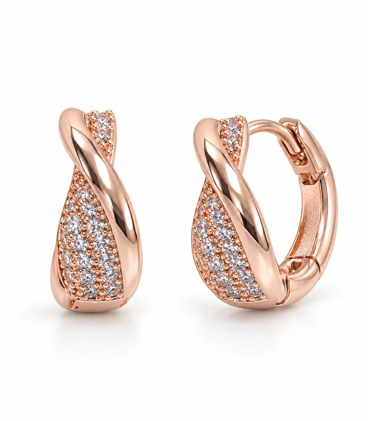JIMIKI Rose Gold Tone crossover pave huggie hoop earrings, pair on white background #color_rose-gold-tone
