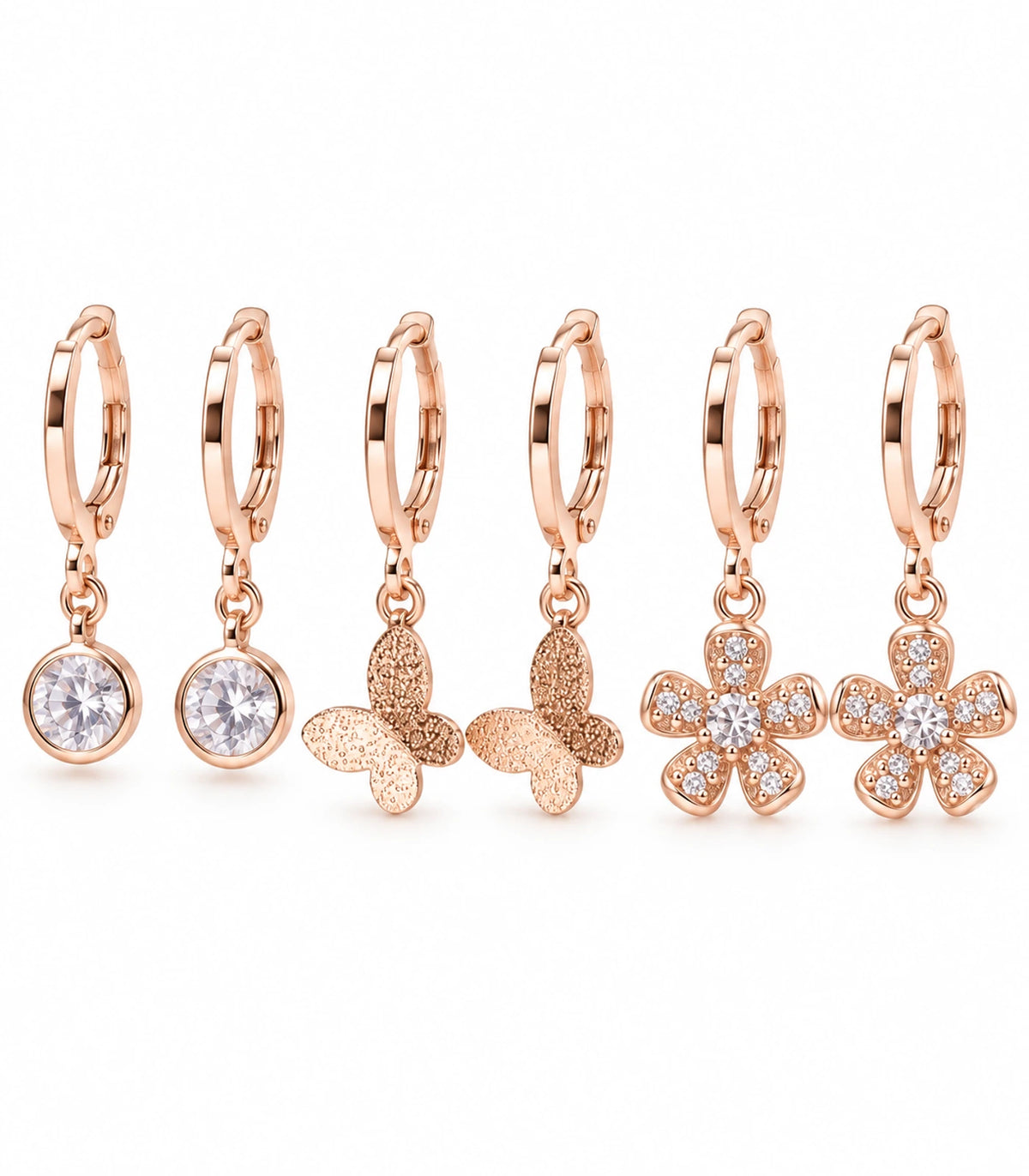 Complete rose gold tone three-pair hoop earring set: crystal, butterfly and flower pairs
