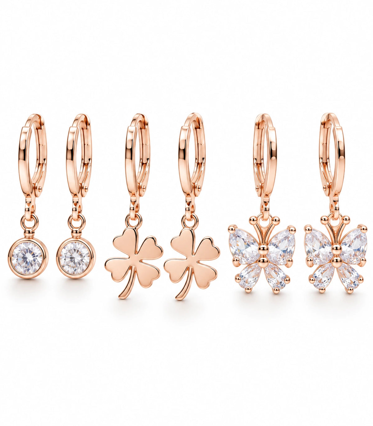 Complete rose gold tone three-pair hoop earring set: crystal, clover and butterfly designs; six earrings