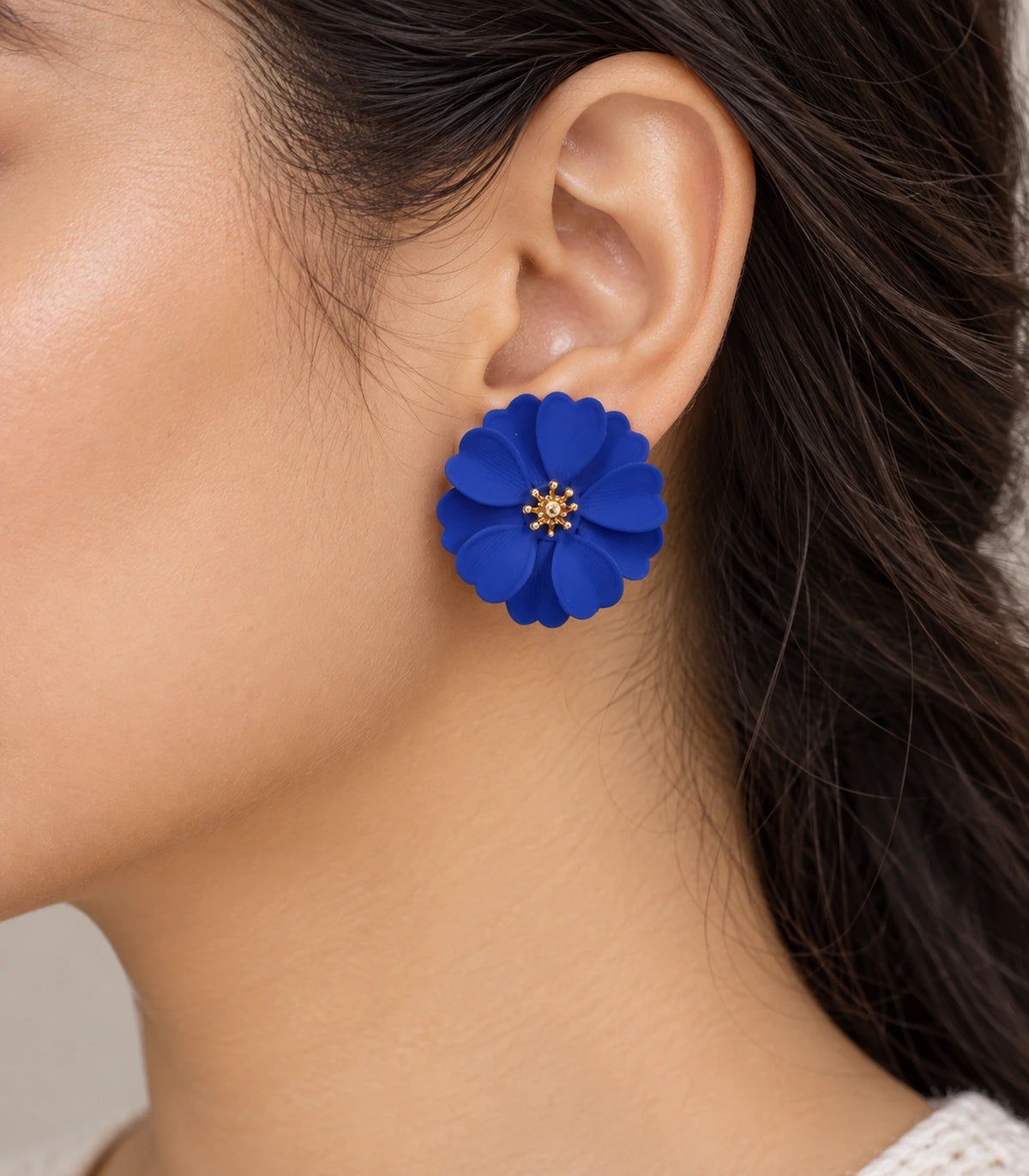JIMIKI Royal Blue Layered Daisy Stud Earrings - earring worn on model #color_royal blue