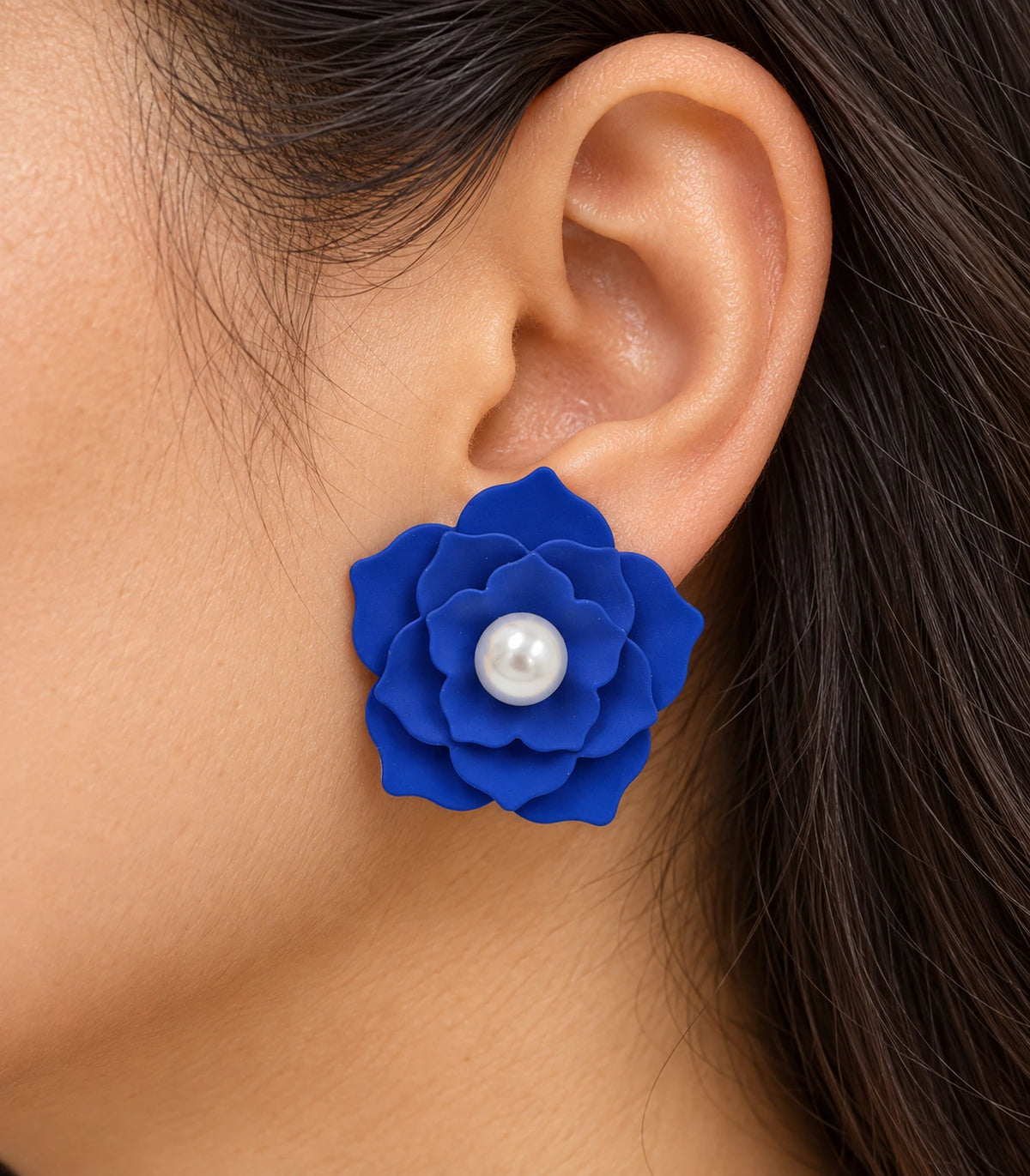 JIMIKI Layered Flower Pearl Stud Earrings, Royal Blue — worn close-up showing petal detail #color_royal blue