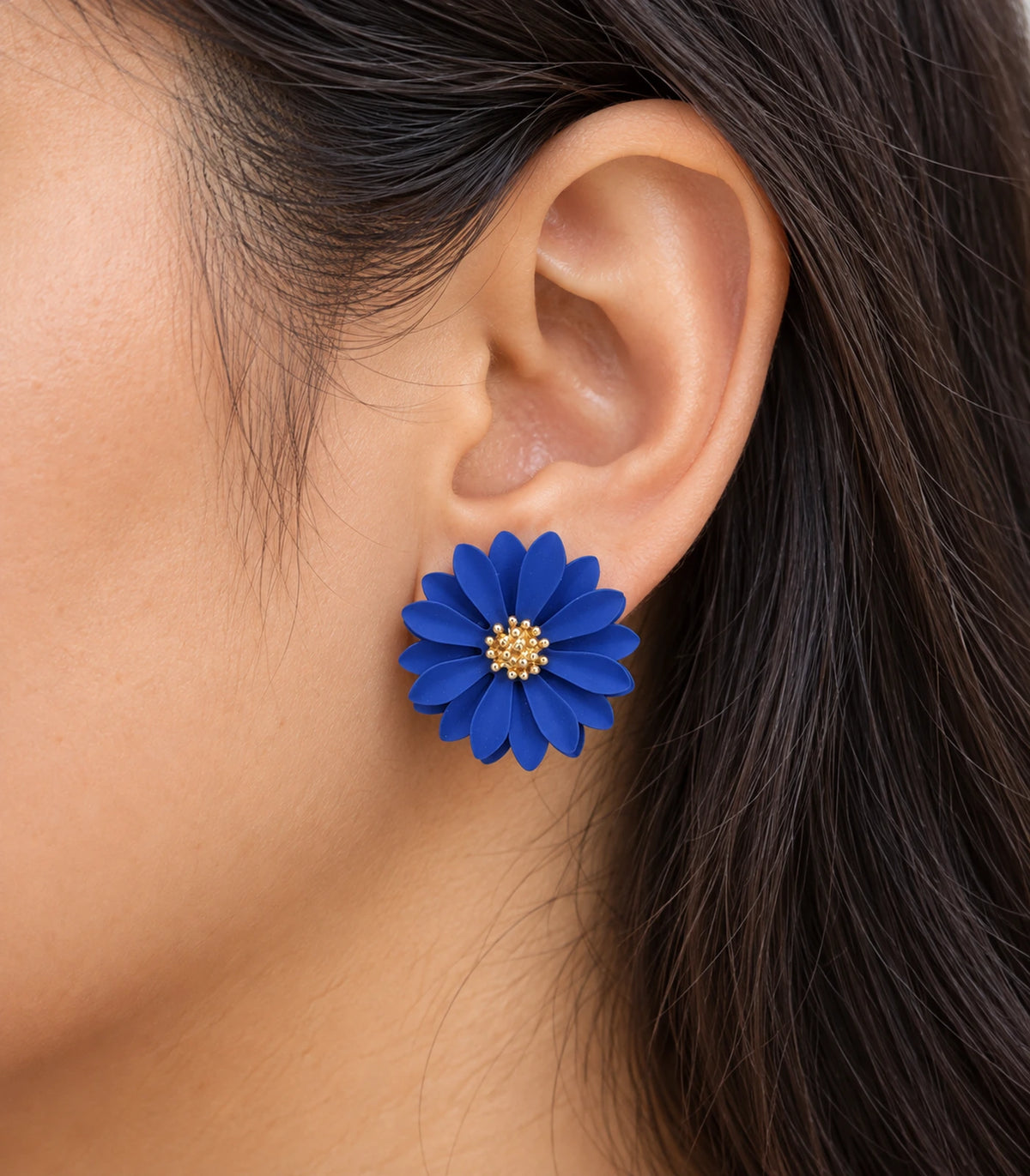 JIMIKI Royal Blue layered starburst daisy stud earrings, close-up of layered petals and gold-tone centre #color_royal blue