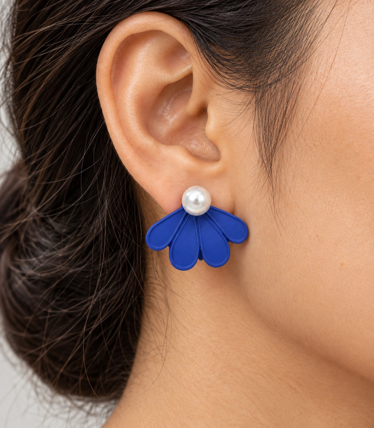 JIMIKI Royal Blue pearl fan petal stud earrings, worn closeup of four petals and pearl-style bead #color_royal blue