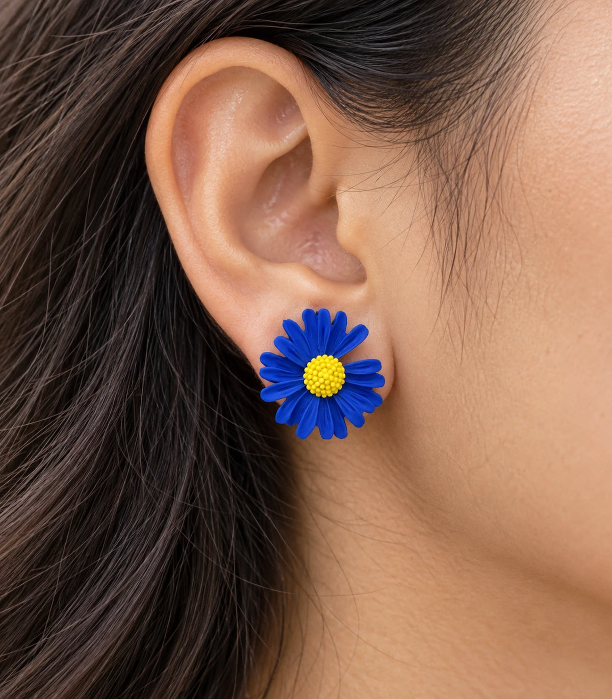 JIMIKI Royal Blue yellow centre daisy stud earrings, close-up of grooved petals and yellow centre #color_royal blue