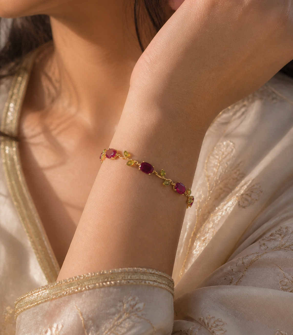 Close-up of Ruby Red & Green Leaf Vine Bracelet