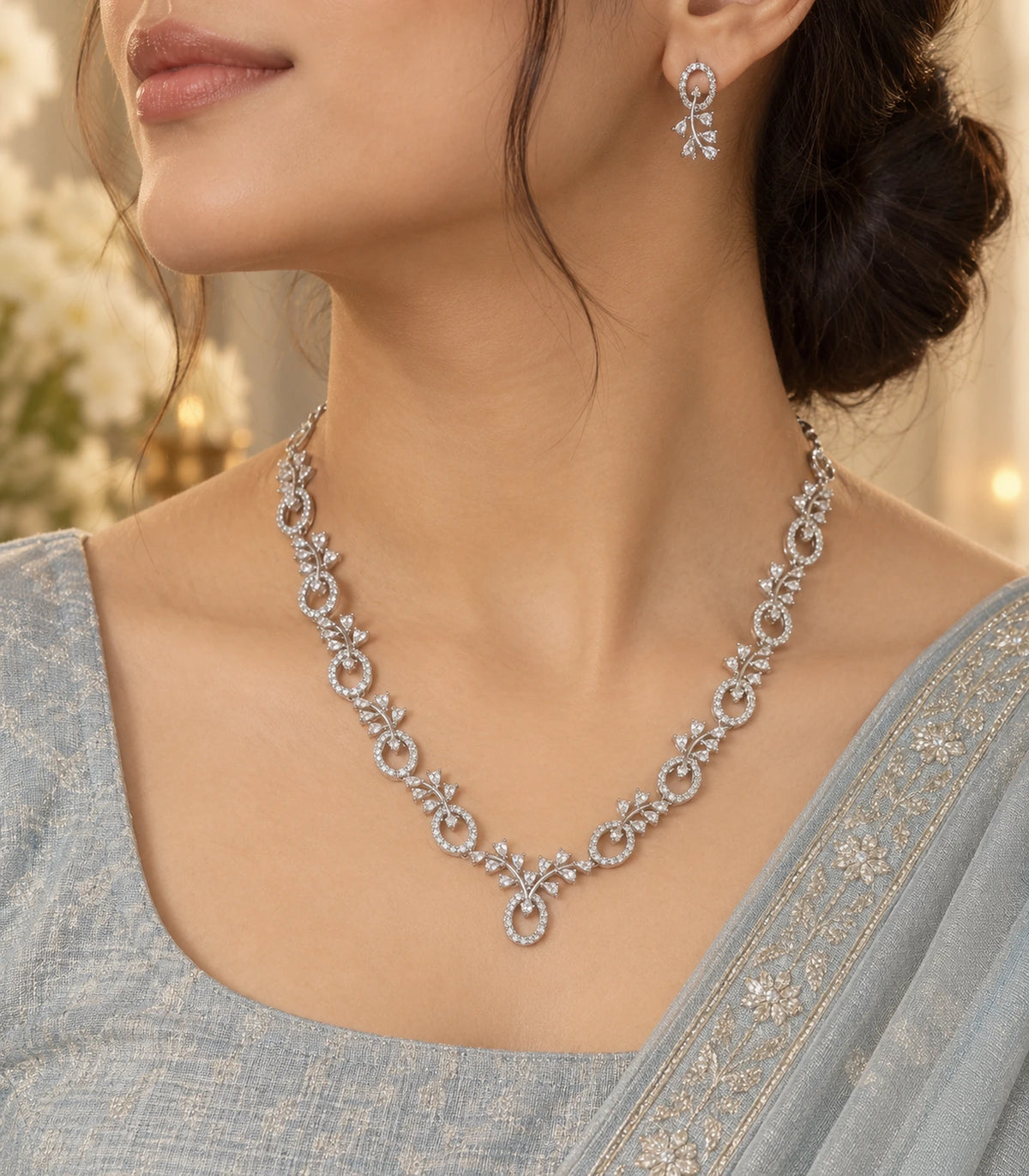 Silver Clear Floral Drop Crystal Necklace Set worn with a blue outfit