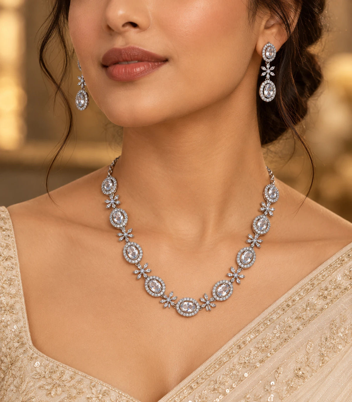 Silver clear oval floral necklace set styled with a cream outfit
