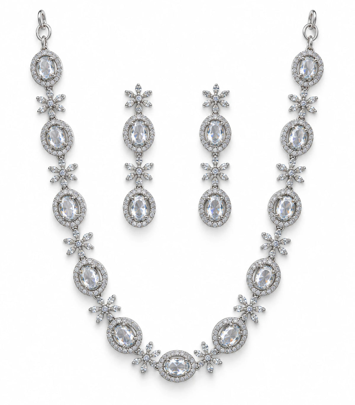 Silver clear oval floral necklace set with matching earrings on a white background