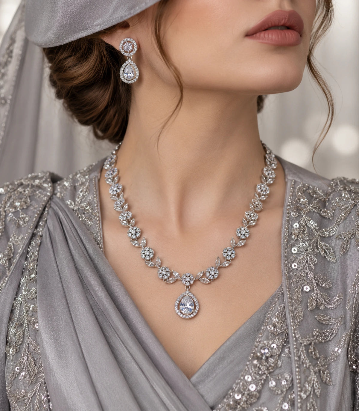 Silver clear crystal necklace and matching earring in a styled silver outfit