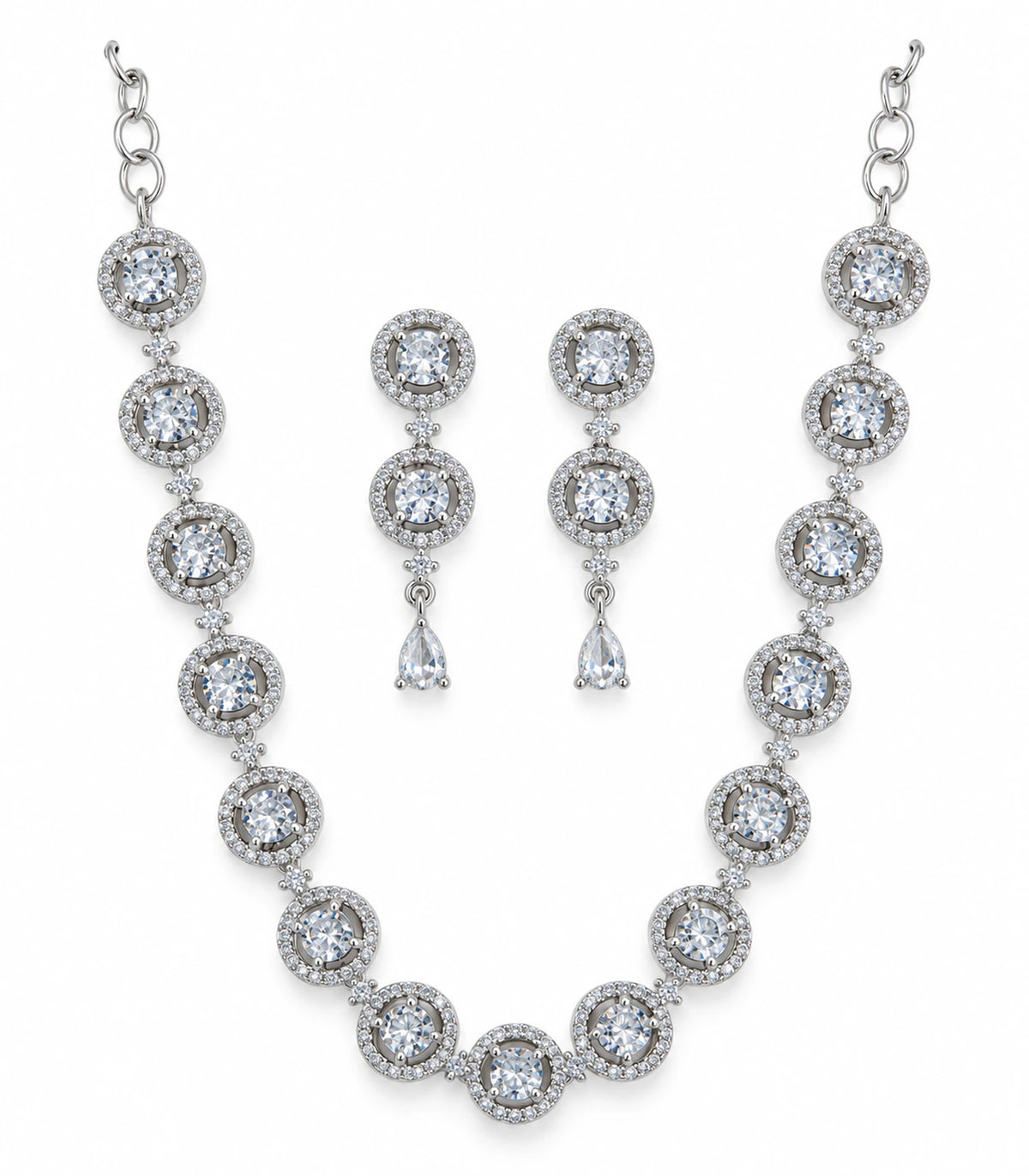 Silver-tone clear round halo necklace with matching two-halo pear-drop earrings on a white background